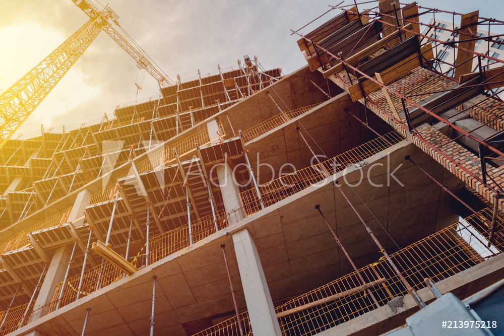 Building construction site with scaffolding